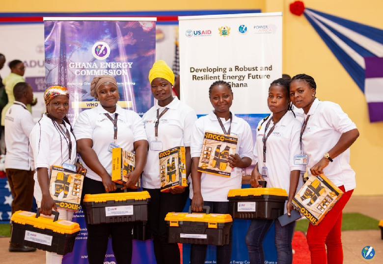 Some of the female wiring professionals in a picture with the toolkits donated by USAID via the Power Africa initiative